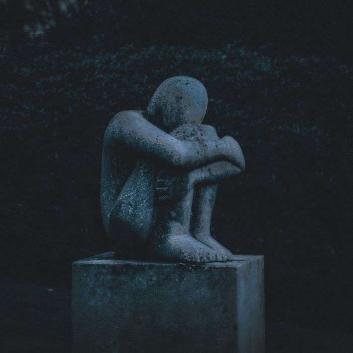 EFIT Image of a person hunched over in depression or anxiety